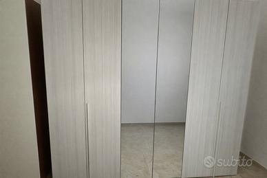 Armadio 6 ante con specchio grande