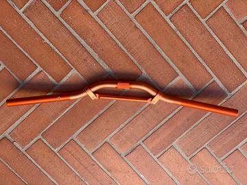 manubrio arancione TNT