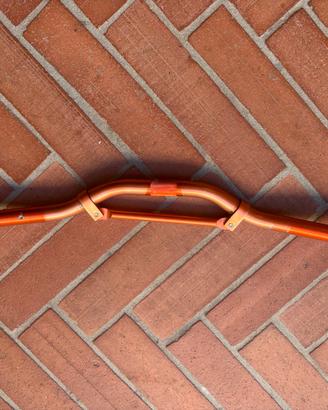 manubrio arancione TNT