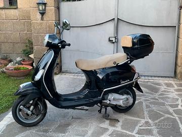   vespa piaggio  150 lx  colore blu 