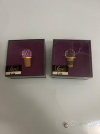 Tappi per bottiglie in cristallo e metallo dorato