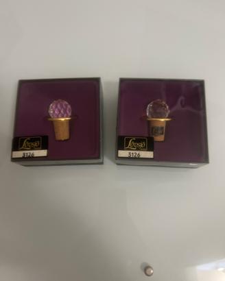 Tappi per bottiglie in cristallo e metallo dorato