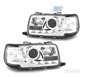 FARI AUDI 80 91-94 LUCE DIURNA FONDO CROMATO