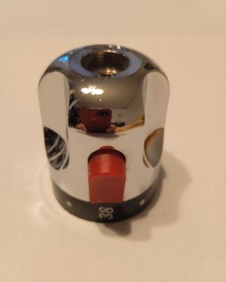 Manopola per miscelatore termostatico.