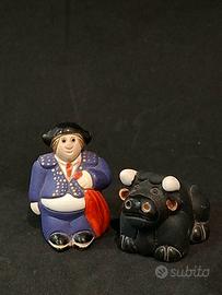 Coppia miniature statuette vintage Matador e Toro 