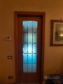 Porta a a scrigno noce e vetro