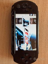 Sony PSP E1004 32GB + Caricatore + batteria origin