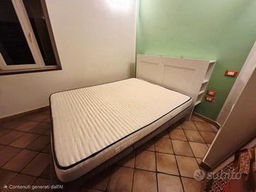 Letto completo di testata in legno e materasso