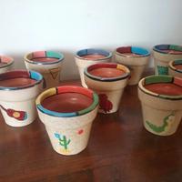 Dieci porta vaso decorati