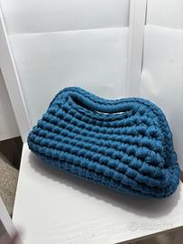 Pochette lavorata a mano