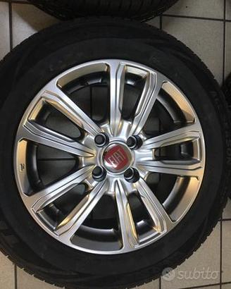 Cerchi in lega 15 Fiat grande punto gomme 4 season