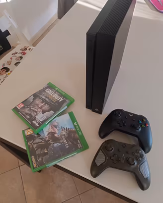 Xbox One x 1TB + 2 controller+ 2 giochi 
