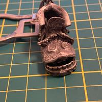 Portachiavi con vecchio scarpone in metallo