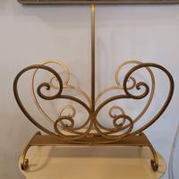 portariviste in ferro battuto dorato 