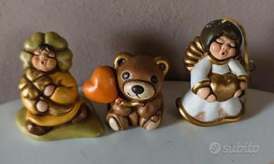 tre  statuette thun