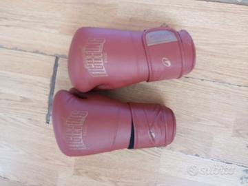 Sacco boxe guantoni e caschetto