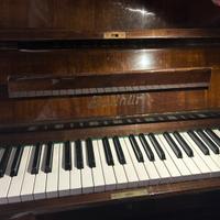 Pianoforte verticale da studio noce lucido