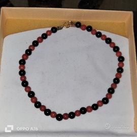 Bracciale in oro 18 kt  corallo e onice – elega
