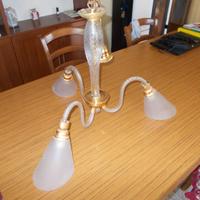 Lampadario ed affettatrice