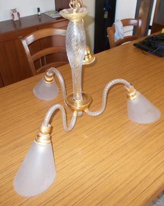 Lampadario ed affettatrice