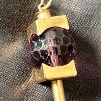 Pendente design 70 in oro e ametista