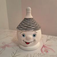 Salvadanaio a forma di trullo.