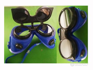 occhiali da saldatore nuovi e strumento di misuraz