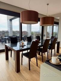 tavolo con piano in marmo nero poliform