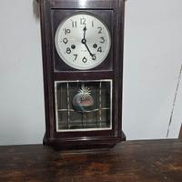 orologio pendolo da parete