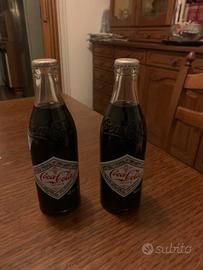 Collezione bottiglie Coca Cola