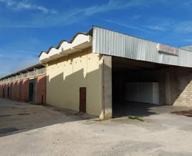 Porzione di capannone artigianale con pertinenze