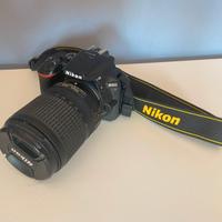 Nikon D5600 + 18-140 mm VR - nuova, touchscreen