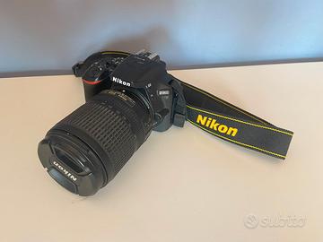 Nikon D5600 + 18-140 mm VR - nuova, touchscreen