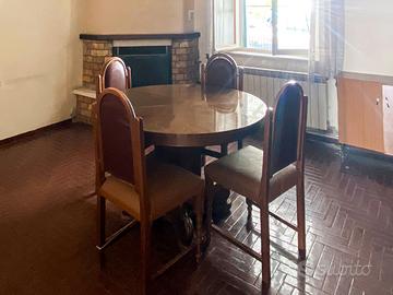 Tavolo da pranzo rotondo estensibile, base solida