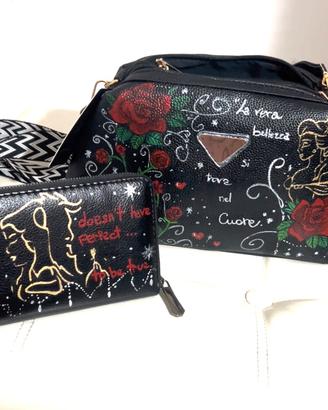 Borsa e portafoglio dipinti a mano