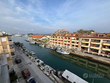 ATTICO VISTA PORTO E LAGUNA CON CAMINETTO E 2 P...