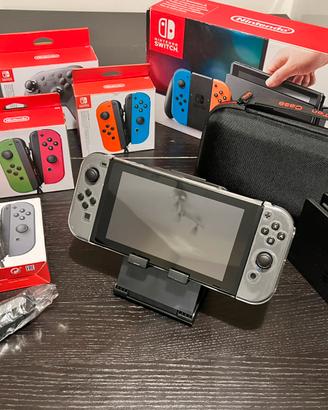 Nintendo Switch1 + 3 Coppie Joy-Con + 13 Giochi