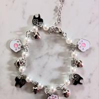 Bracciale con gatti, zampine, cuoricini, perle
