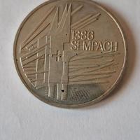 5 Franchi Sempach 1386 del 1986, con la custodia.