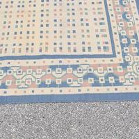 Tappeto in pura lana con disegni 