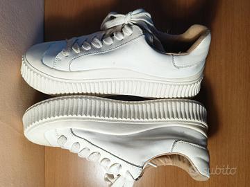 scarpes : Jil Sander Low Basket blanches. 