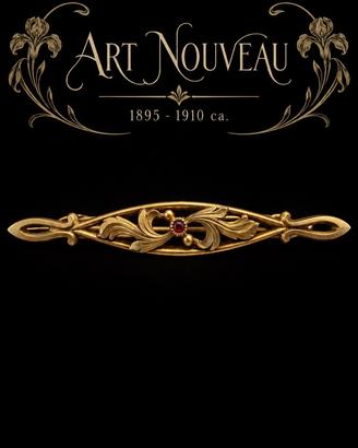 Antica spilla Art Nouveau barretta con granato