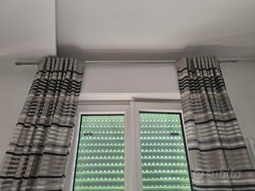 tende da casa con bastoni