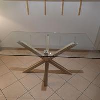 Tavolo in vetro con gambe in legno