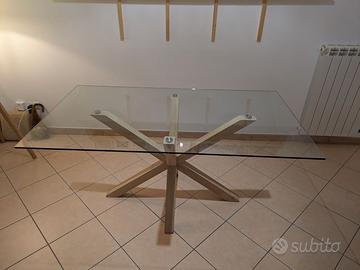 Tavolo in vetro con gambe in legno