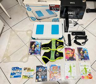 Nintendo wii + balance board + 6 giochi + 2 cinte