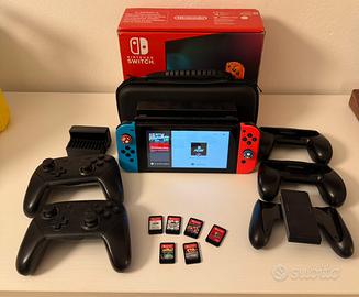 Nintendo switch completa di giochi e accessori