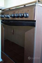 Piano cottura con forno Indesit