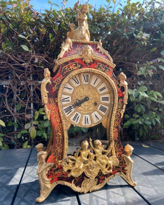 Orologio antico da camino