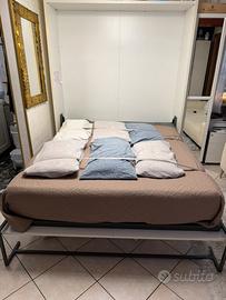 Letto matrimoniale scomparsa con libreria